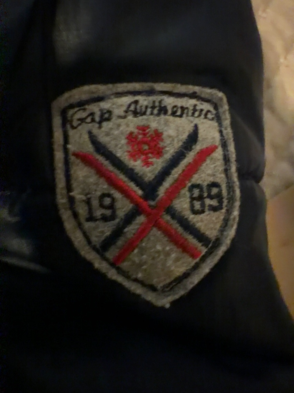 GAP Black Puffer Jacket with Red and Navy Crest Patch